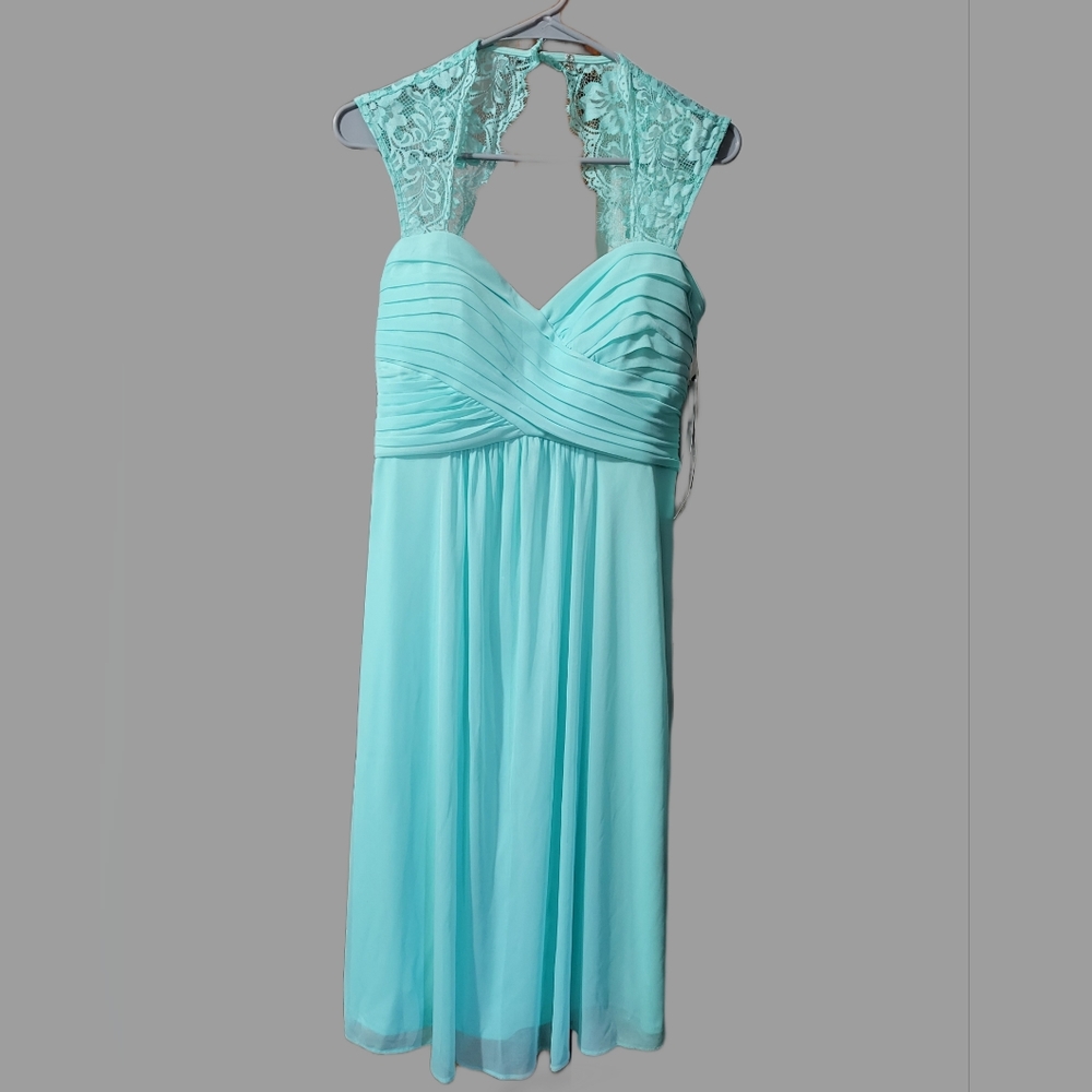 Women's Dress. Size 6. Teal color.